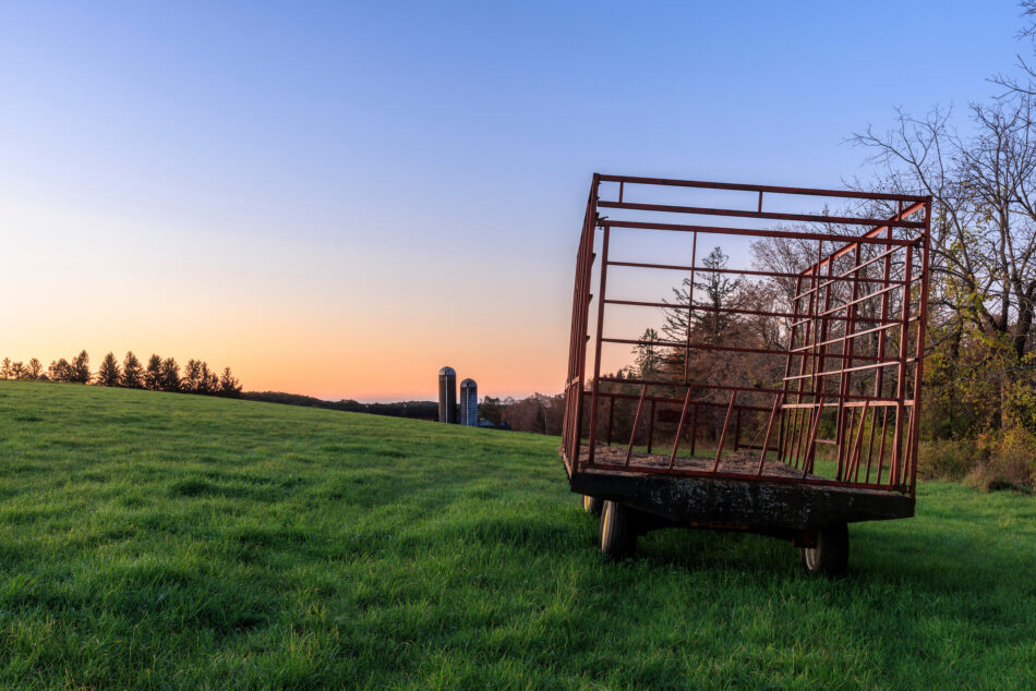 A hay trailer in a field at Milde Farm in Litchfield, Connecticut.